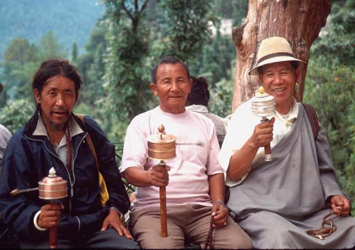 Dharamshala Men with prayer wheels