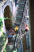 Udaipur View of neighbor chopping peppers in stairwell