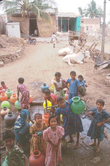 Aihole Village filling water jugs